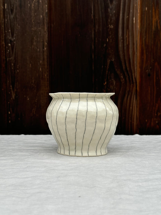 white low vase with rim and pencil stripe