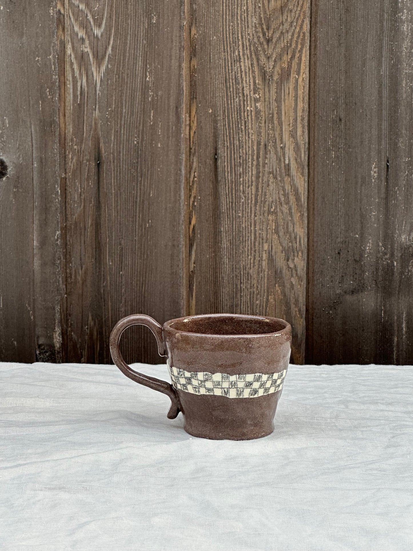 coffee clay mug with white clay inlay and black pencil check *prototype