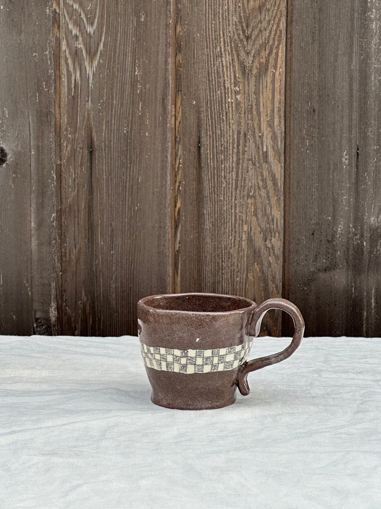 coffee clay mug with white clay inlay and black pencil check *prototype